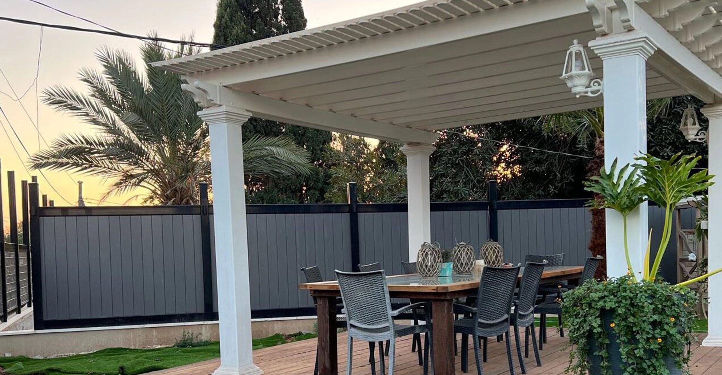 Dark gray PVC picket fence installation in South Florida